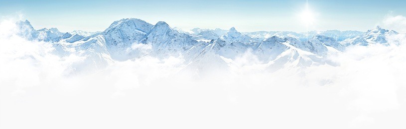 panorama of winter mountains with clouds, bright sun and copy space