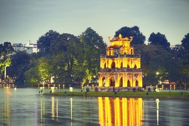 hoan kiem lake (lake of the returned sword) and turtle tower in hanoi - vietnam