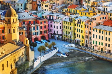 vernazza village, church and buildings aerial view. seascape in five lands, cinque terre national park, liguria italy europe. long exposure.
