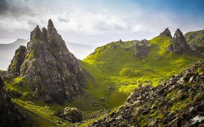 the ancient rocks of old man of storr on a cloudy day - isle of skye, scotland, uk