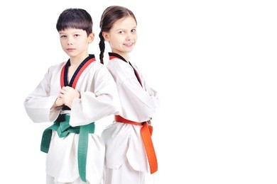 two children athletes martial art taekwondo training