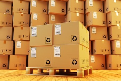 distribution warehouse, package shipment, freight transportation and delivery concept, cardboard boxes on pallet and stack of parcels behind it on wooden floor in the retail store building