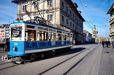 blue tram in zurich, switzerland