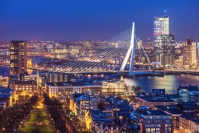 rotterdam skyline with erasmus bridge at twilight as seen from the euromast tower, the netherlands