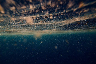 abstract underwater background with plankton