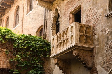 balcony of juliet's house in verona, italy photographed from the street in the summer day