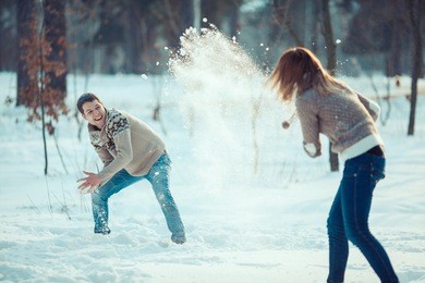 couple playing snowball