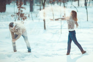 couple playing snowball