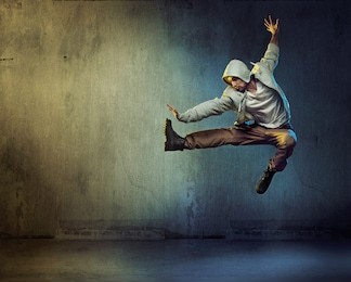 sporty hip-hop dancer jumping