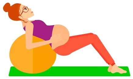 pregnant woman on gymnastic ball.