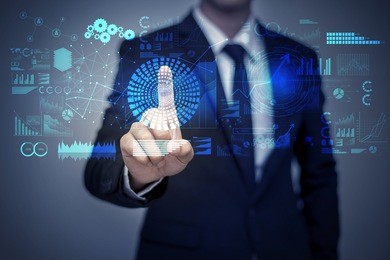 businessman in suit working with digital virtual screen