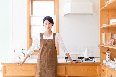 young asian woman in the kitchen