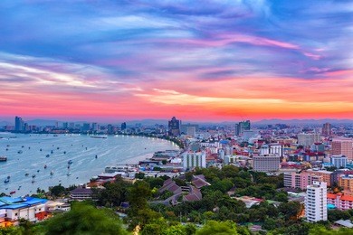the building and skyscrapers in twilight time in pattaya,thailand. pattaya city is famous about sea sport and night life entertainment.