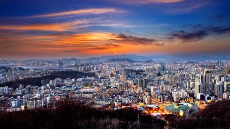 view of downtown cityscape and seoul tower in seoul, south korea.