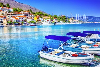 fishing boats at the coast of kefalonia, greece