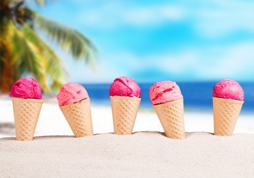  ice cream cones in the sand on the beach