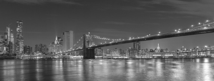 brooklyn bridge and manhattan at night, new york city, usa.
