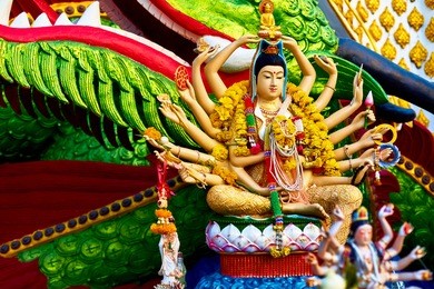 religion in thailand. statue of eighteen arms guanyin ( shiva, buddha cundi bodhisattva ) with dragon in wat plai laem, the big buddha temple at koh samui. place for praying. buddhism symbol. 