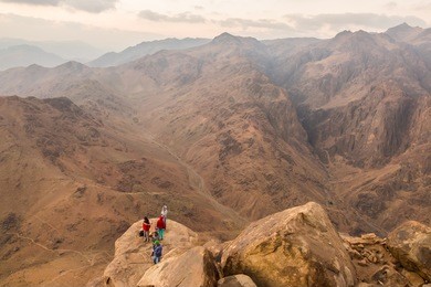 mount sinai, egypt - october 13: pilgrims and tourists from the mount sinai peak (holy mount moses) in early morning on october 13, 2014.