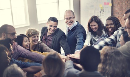 team teamwork join hands partnership concept