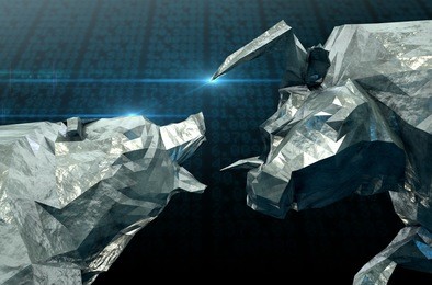 a closeup of two chiseled metal depicting a stylized bull and a bear in contrasting light on a stock market background