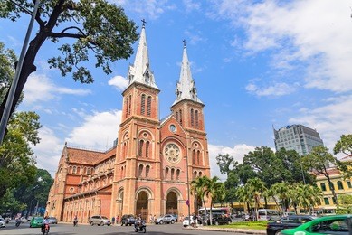 saigon notre-dame cathedral basilica (basilica of our lady of the immaculate conception) on blue sky background in ho chi minh city, vietnam. ho chi minh is a popular tourist destination of asia.
