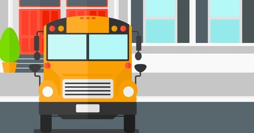 yellow bus on the background of school building.