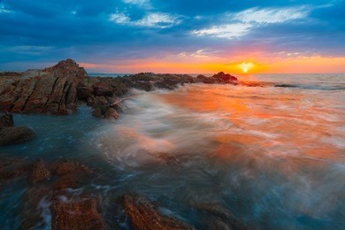 sunset scenic in borneo tropical beach.