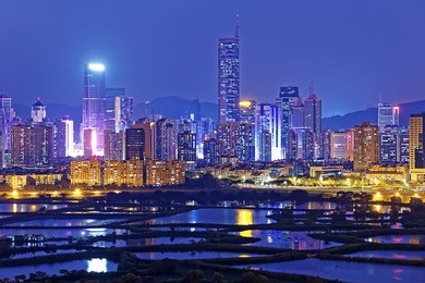 shenzhen citscape at night , view from hiong kong countryside