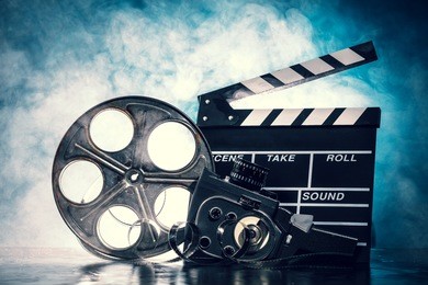 retro film production accessories still life. concept of film-making. smoke effect on background