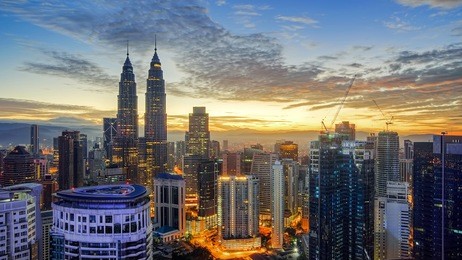 beautiful view of kuala lumpur city centre from a rooftop at sunrise