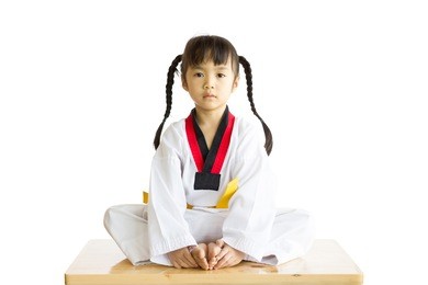 taekwondo warm up by asian girl.