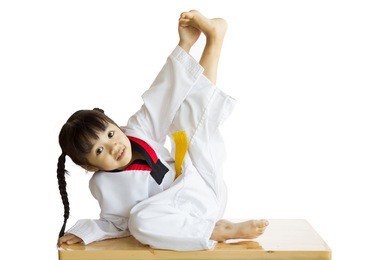 taekwondo warm up by asian girl.