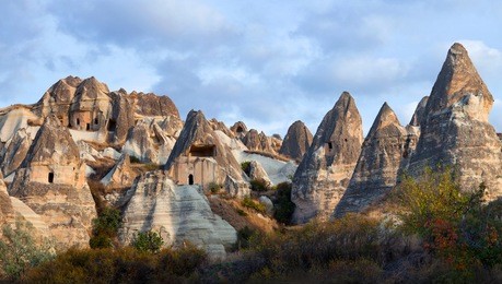 panorama of unique geological formations in cappadocia, turkey. cappadocian region with its valley, canyon, hills located between the volcanic mountains erciyes, melendiz and hasan.