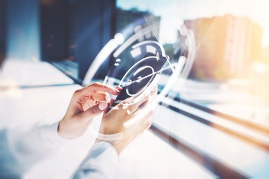 girl touching a screen of her smarthone. blurred background, horizontal, visual effects