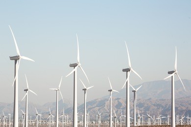 windmill - turbine farm in california
turbines near palm springs, california. mountains in the background with an emphasis on the turbines