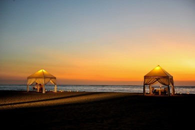 beautiful sunset at kuta beach, bali, indonesia
