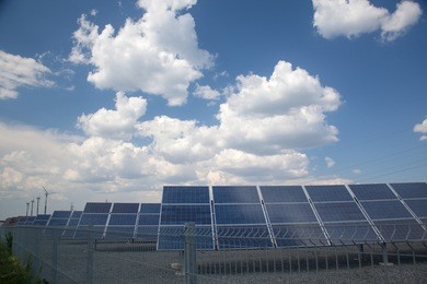 real solar panels and windmill
