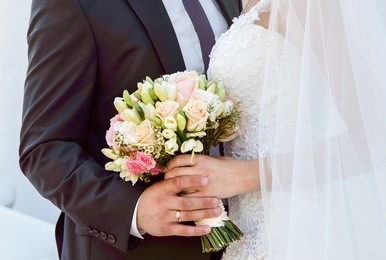 wedding couple with the bouquet