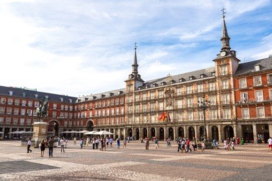 statue of philip iii at mayor plaza in madrid in a beautiful summer day, spain