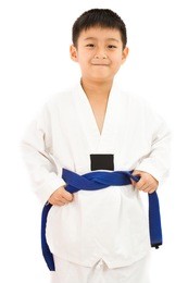 asian little karate boy in white kimono on white background