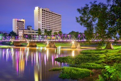 chiang mai, thailand hotel skyline on the ping river.