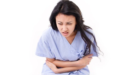 woman patient suffering from stomachache