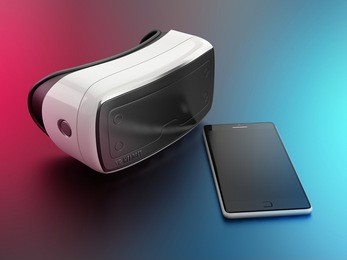 virtual reality headset and mobile smartphone on colorful background