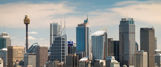 panoramic view at sydney city urban skyline from western plains with blue sky and clouds on a bright day
