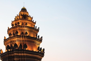 the twilight time at independence monument which is the one of landmark in phnom penh, cambodia