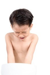 young boy wash his face by fresh water in white bathroom.