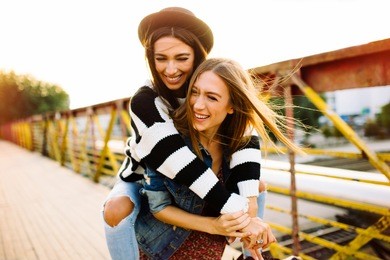 two sisters having fun outdoor