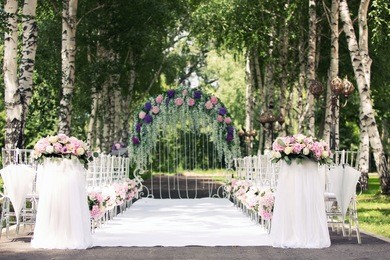 wedding arch from flowers in the wood
