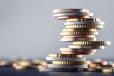 euro coins stacked on each other in different positions.